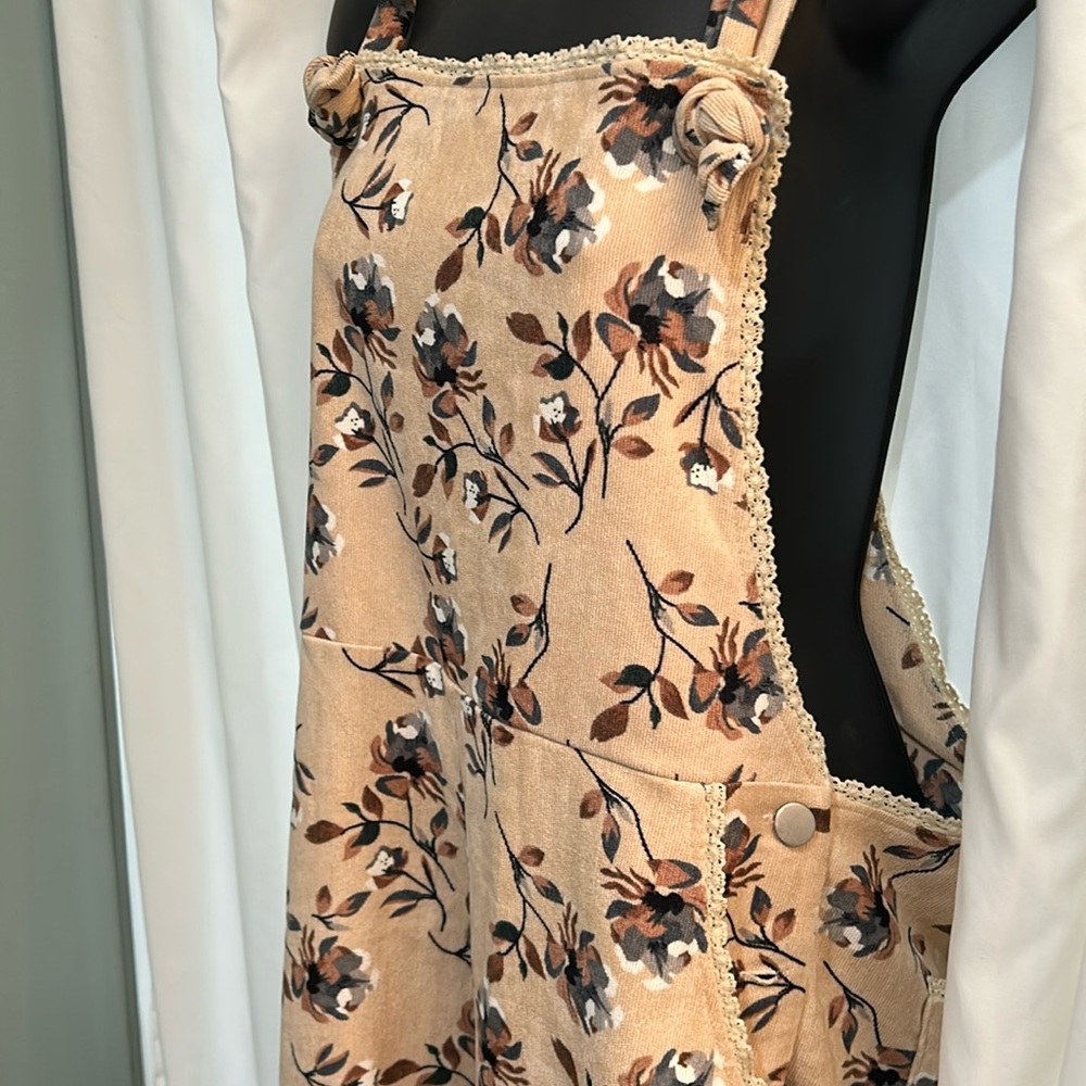 Storia Tan and Black Jumpsuit with Floral Pattern